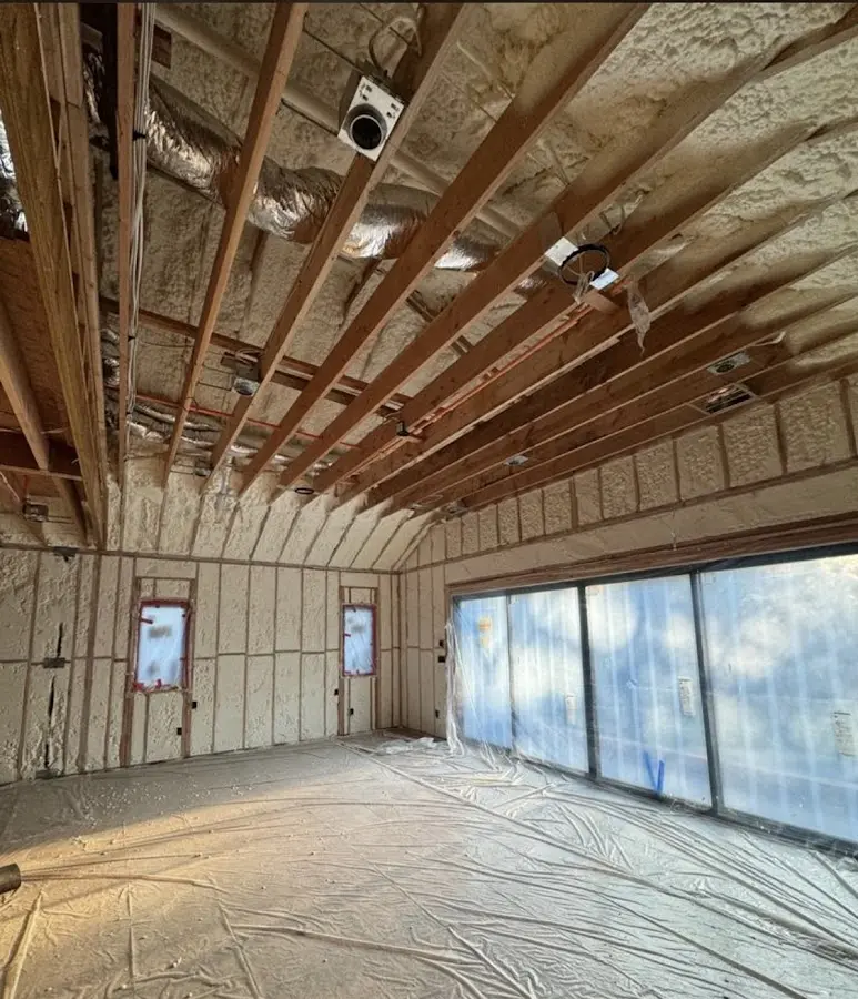 Interior walls and ceiling insulated with spray foam during new construction in Sullivan